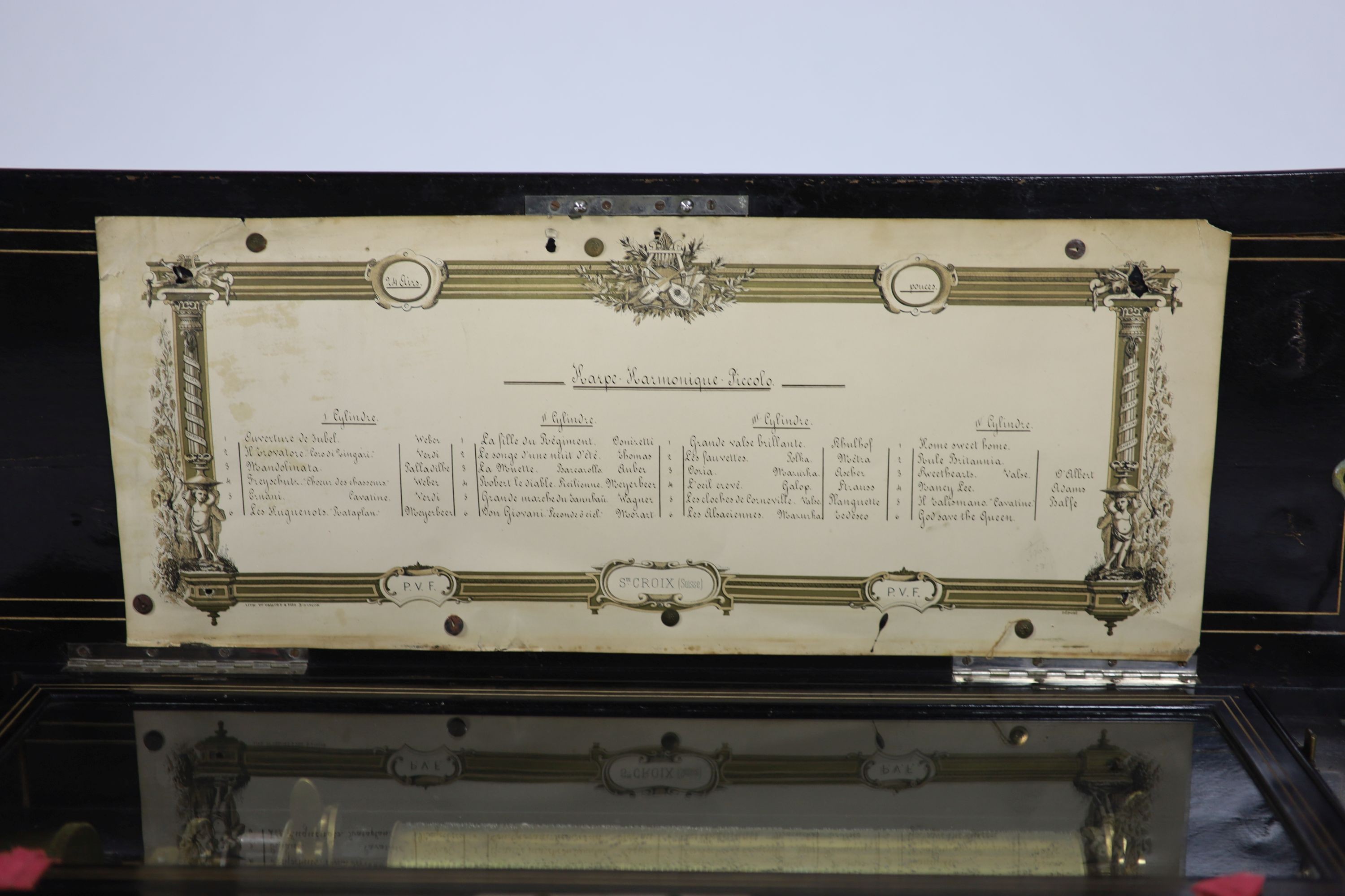 A late 19th century Swiss harpe harmonique piccolo cylinder music box H 21cm. W 84cm. D 31cm.